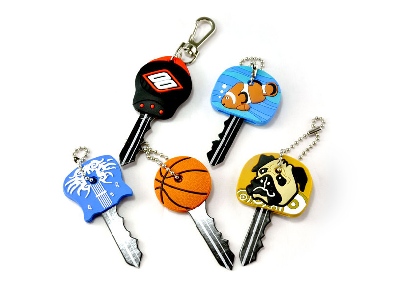 A set of keys with different sports logos.